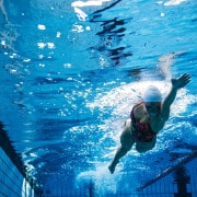 Fit female athlete swimming in pool