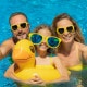 Happy family in outdoor pool